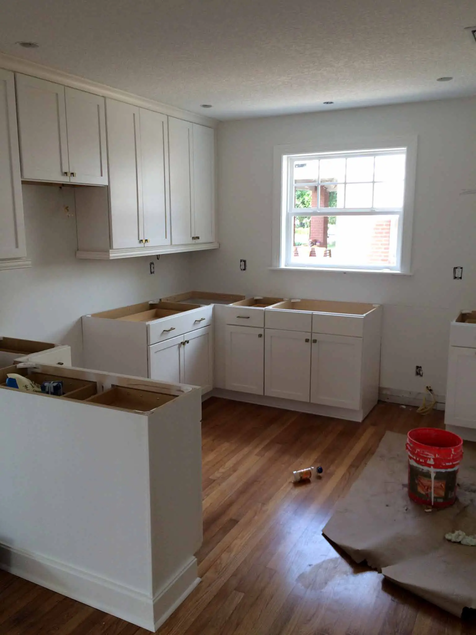 Kitchen Cabinetry Being Installed - That Homebird Life