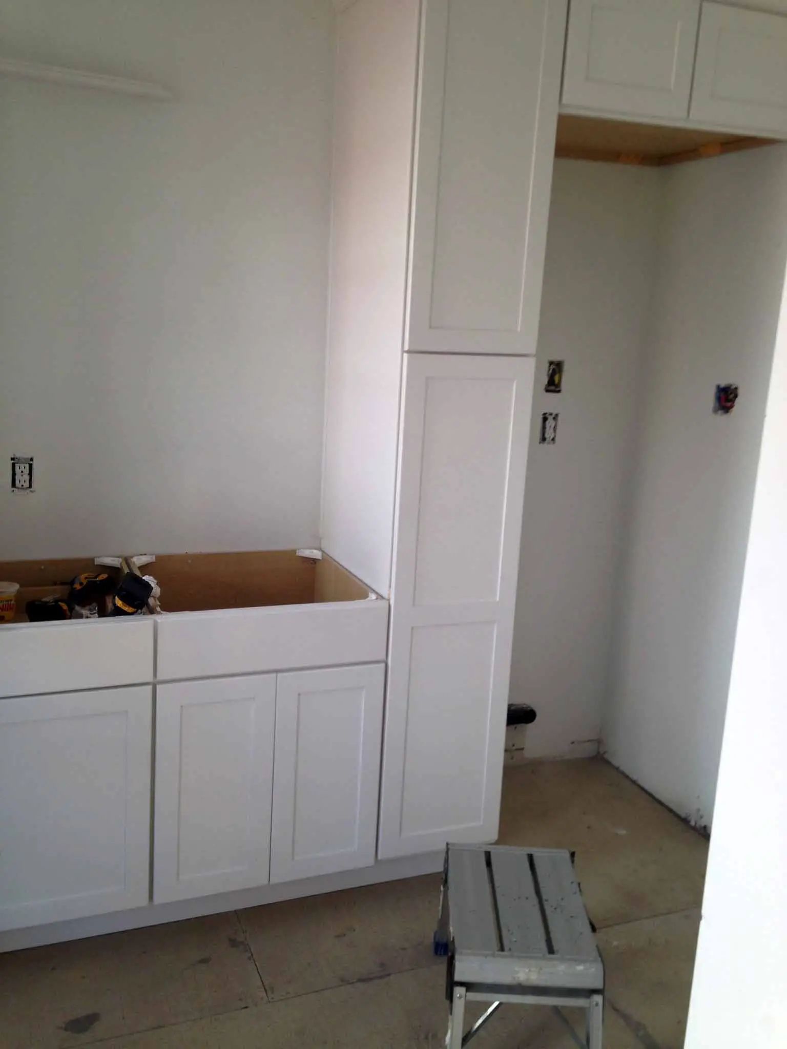 Mudroom/Laundry Room Cabinetry Being Installed - That Homebird Life