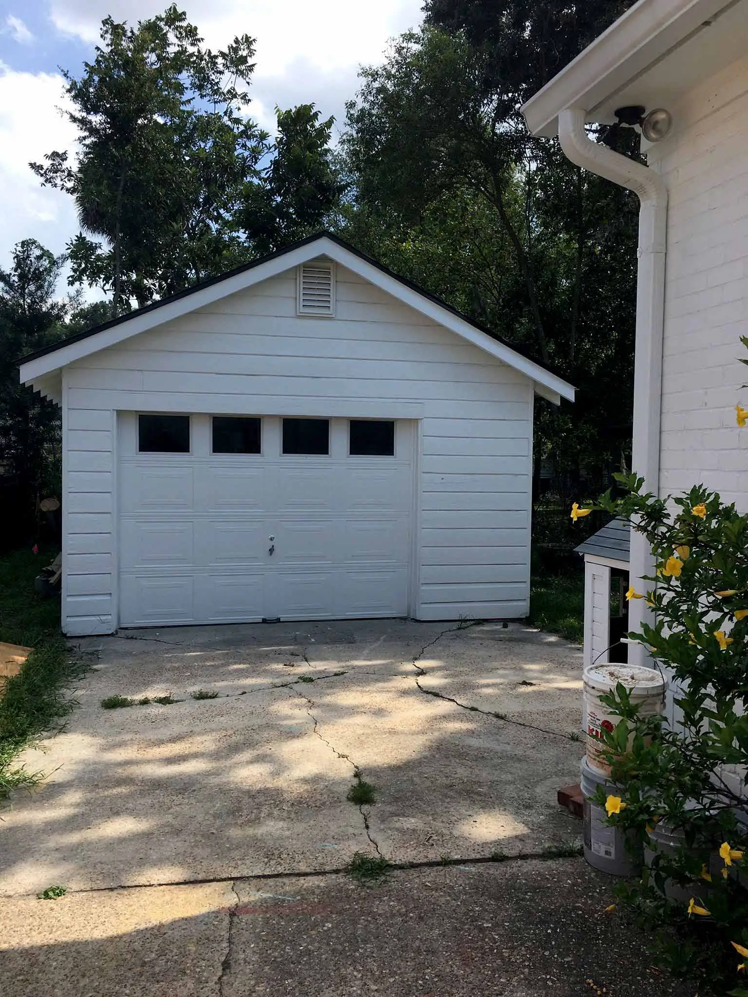 Before photo of the backyard and garage - That Homebird Life Blog