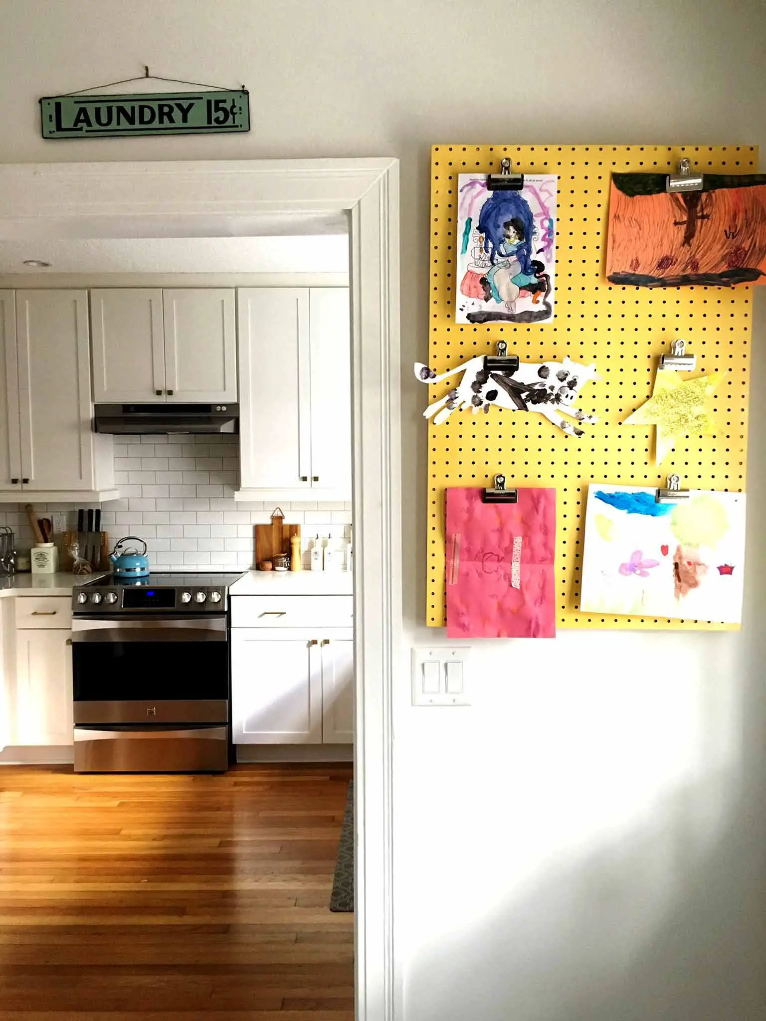 Pegboard display board - 4 simple steps to keeping your kids' artwork organized - That Homebird Life Blog