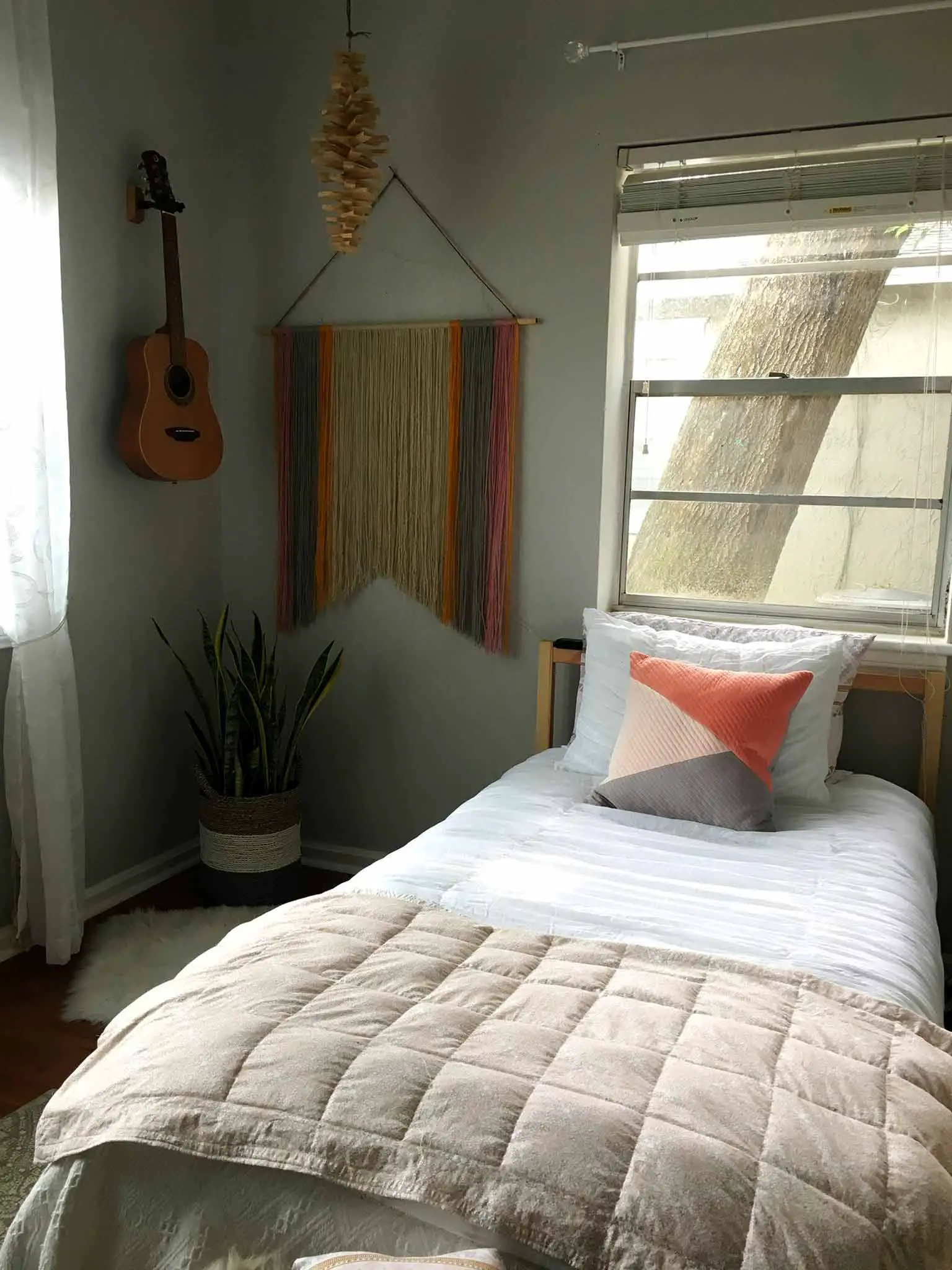 White bedding with a weighted blanket - modern boho tween bedroom - That Homebird Life Blog
