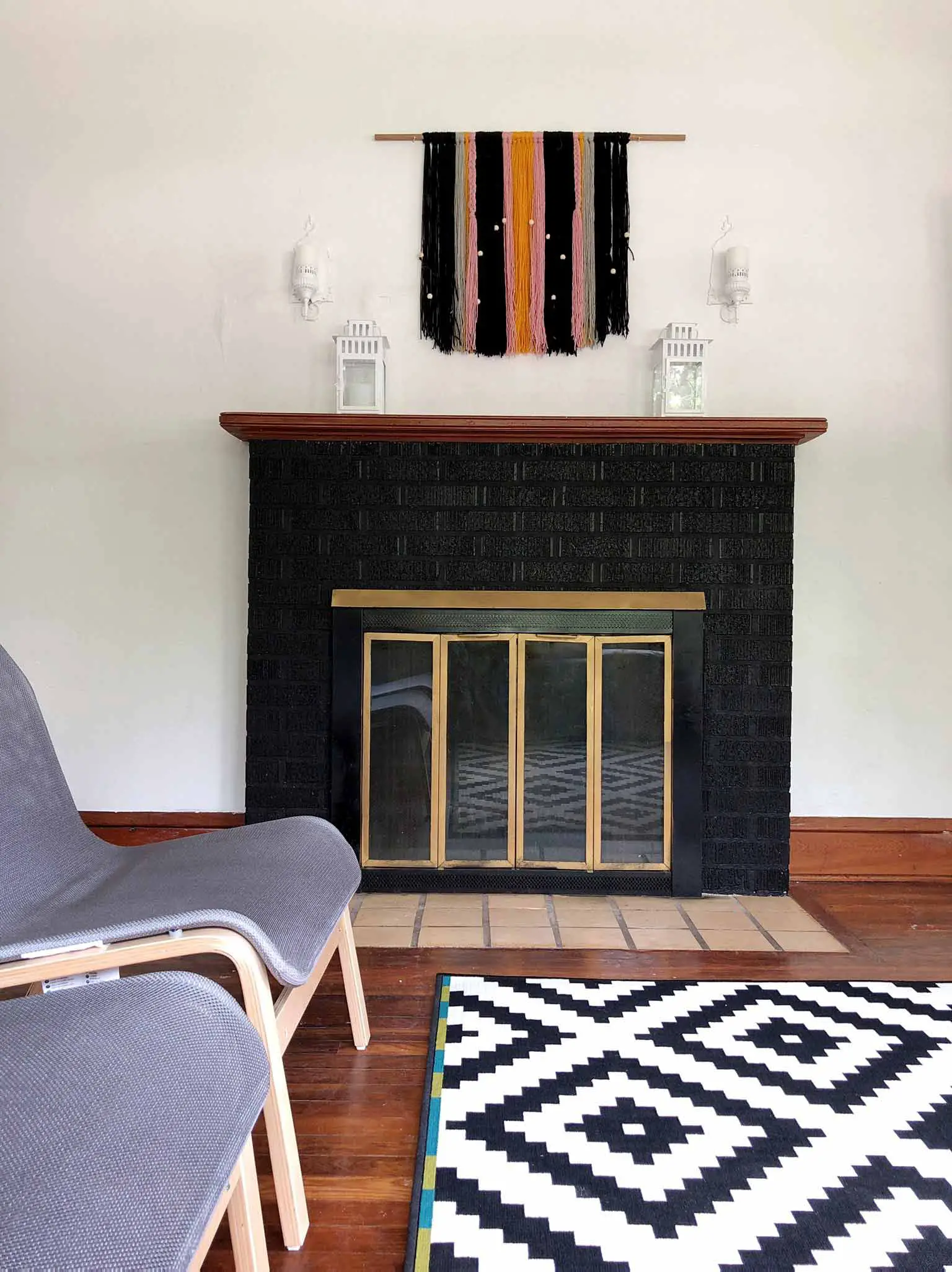 Painted brick fireplace - Modern minimalist room makeover on a budget - That Homebird Life Blog