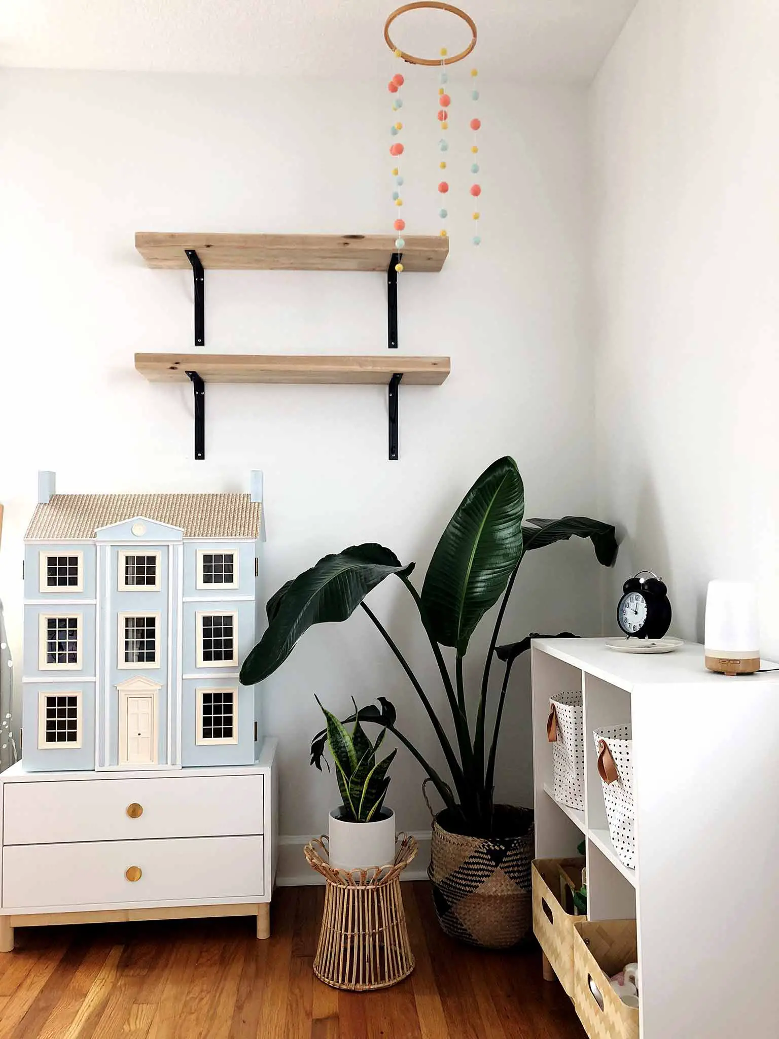 Corner of girls bedroom with wall shelves, plants, doll house and IKEA EKET storage - Guest Participant of the One Room Challenge - That Homebird Life Blog