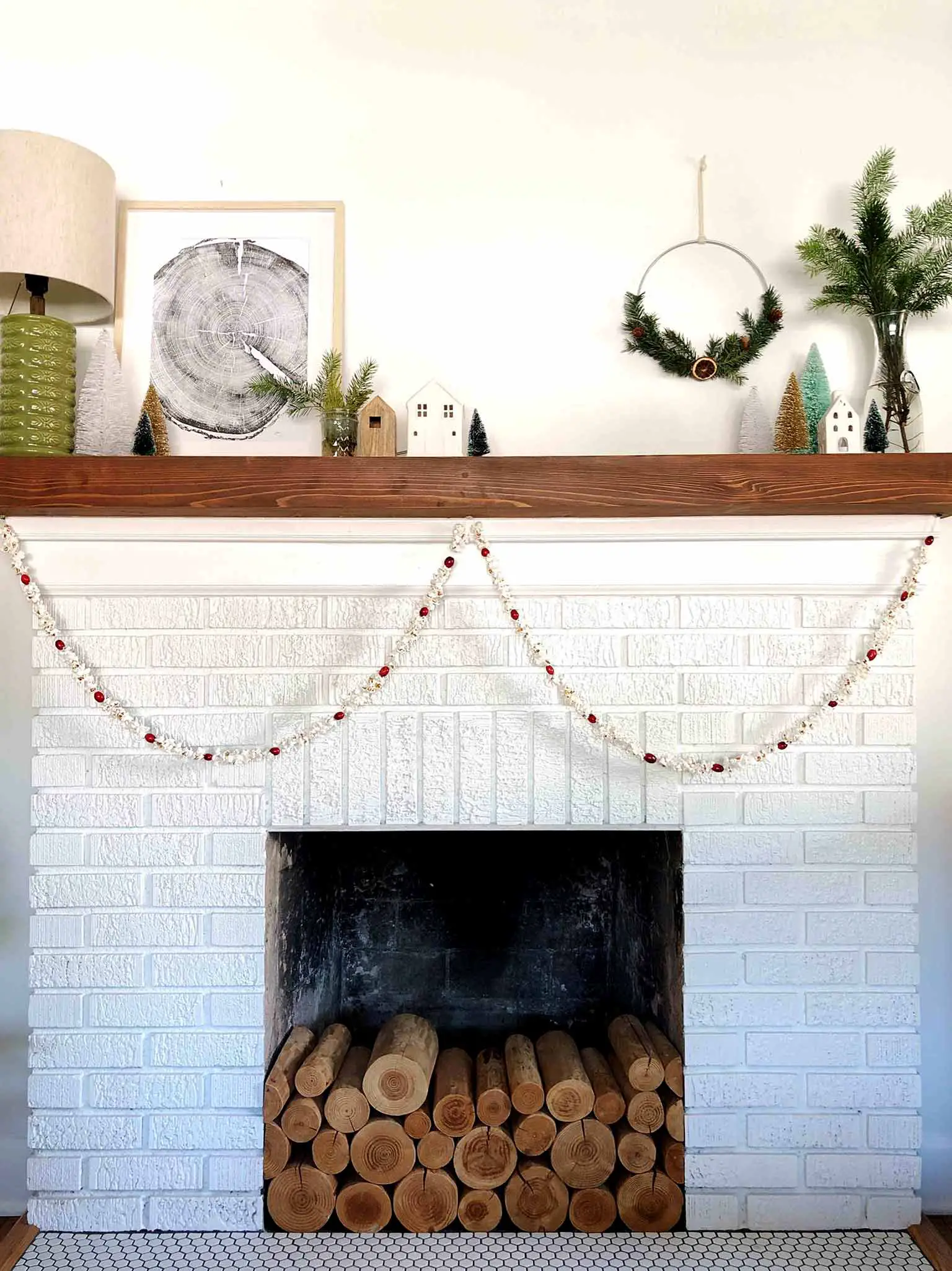 popcorn and cranberry garland on mantel