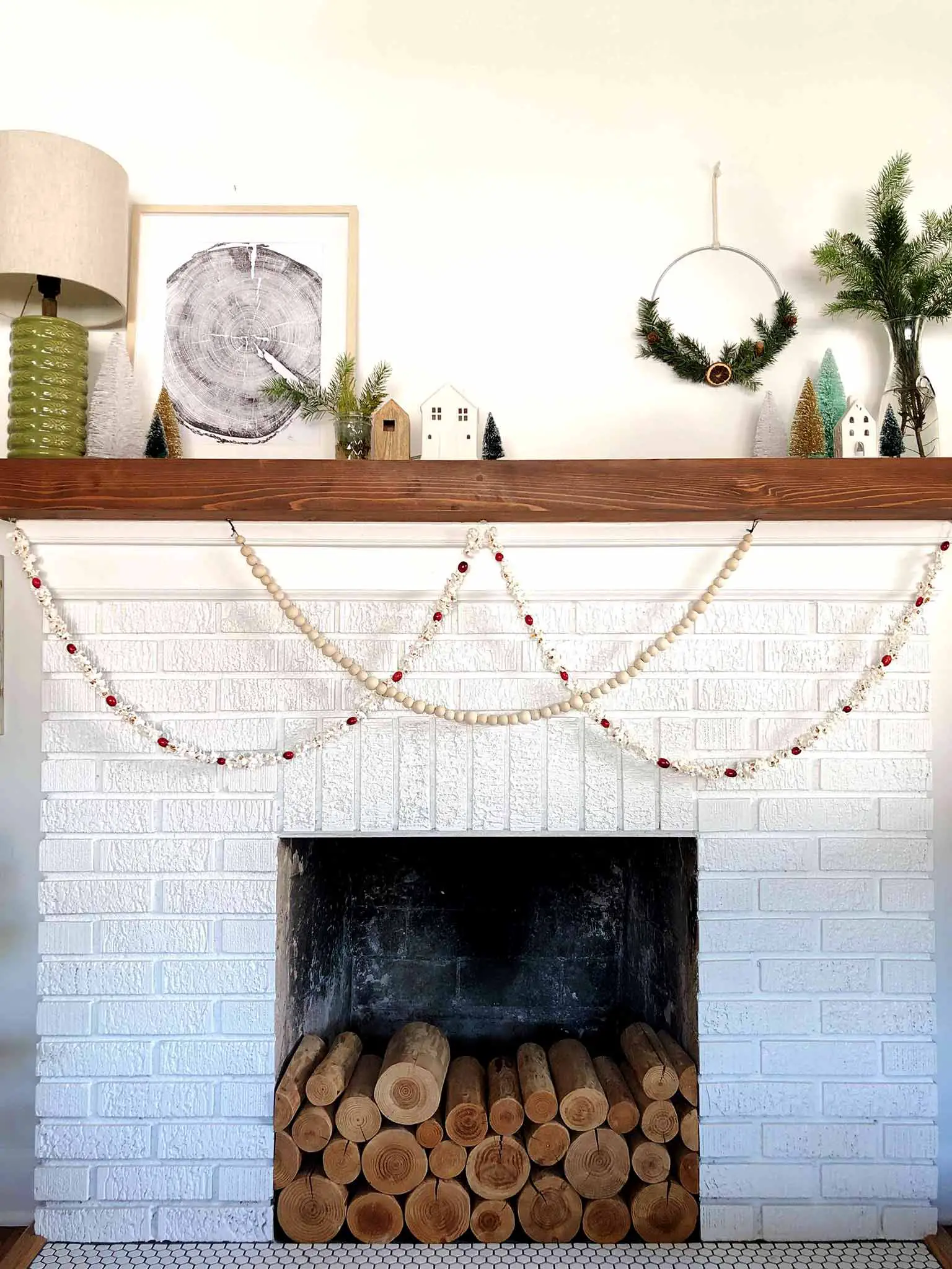 two garlands on a brick fireplace