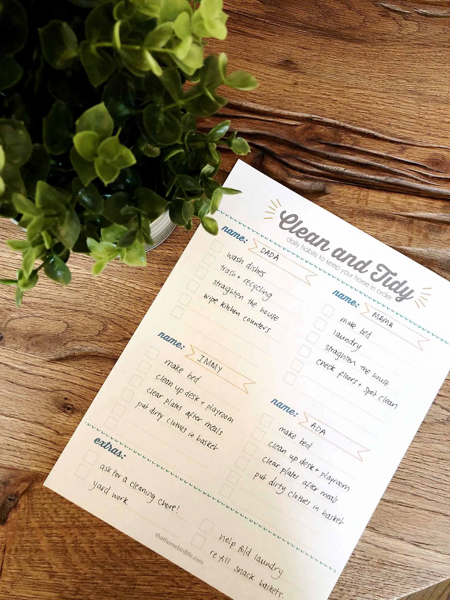 Cleaning checklist printable next to a plant
