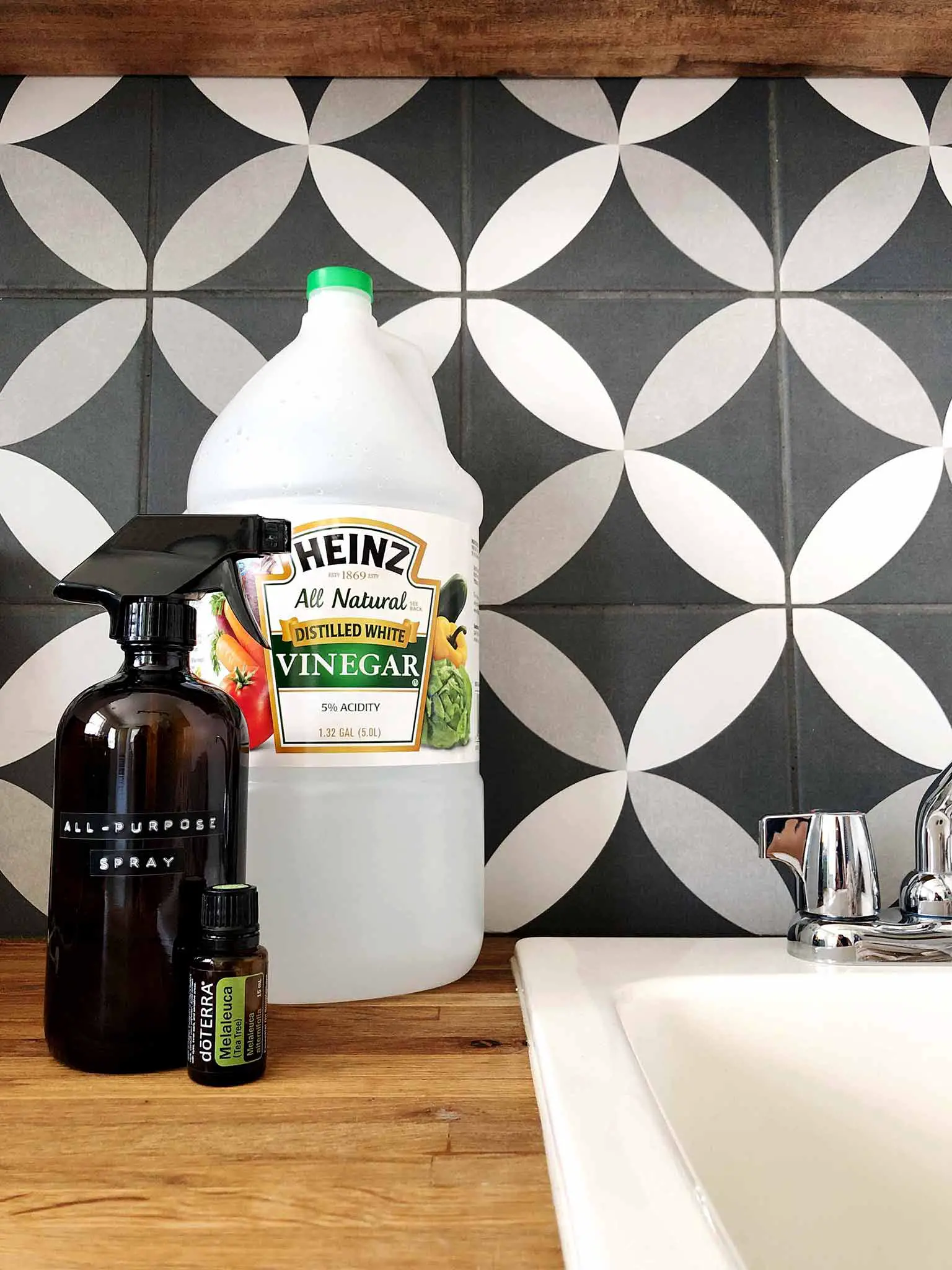 tile backsplash with vinegar, essential oil and cleaning spray