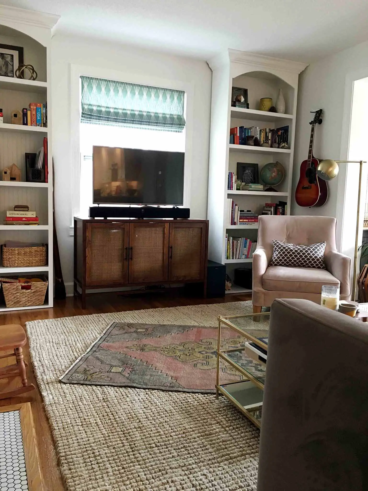 Living room with layered rugs - That Homebird Life Blog