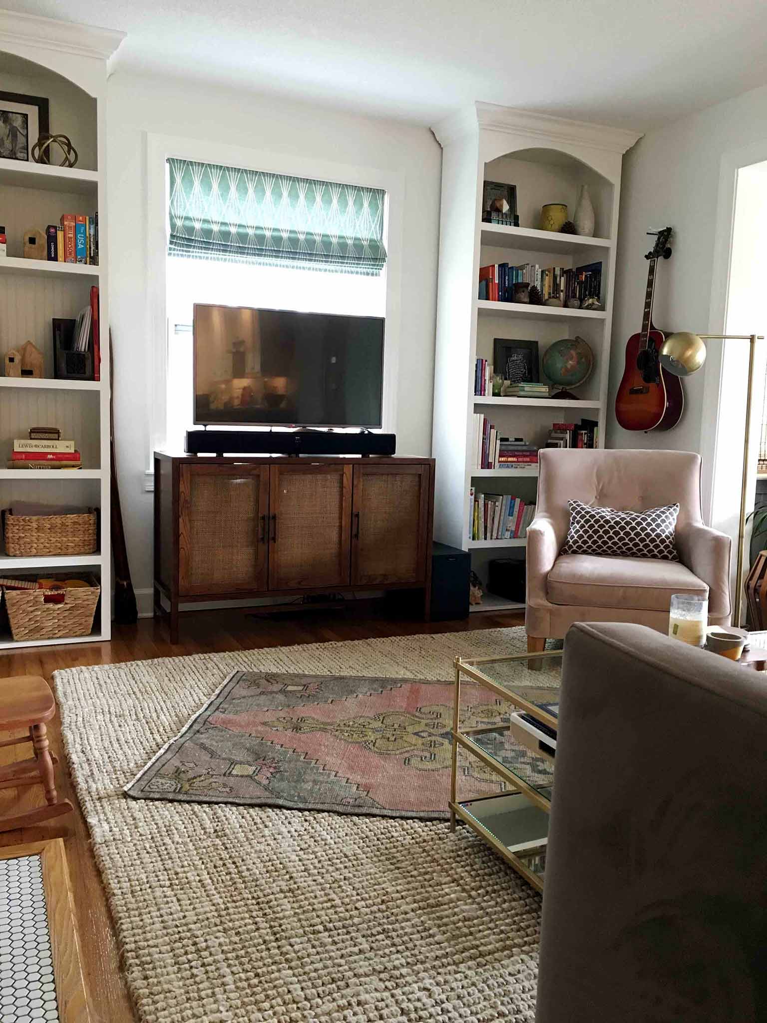 Living room with layered rugs - That Homebird Life Blog