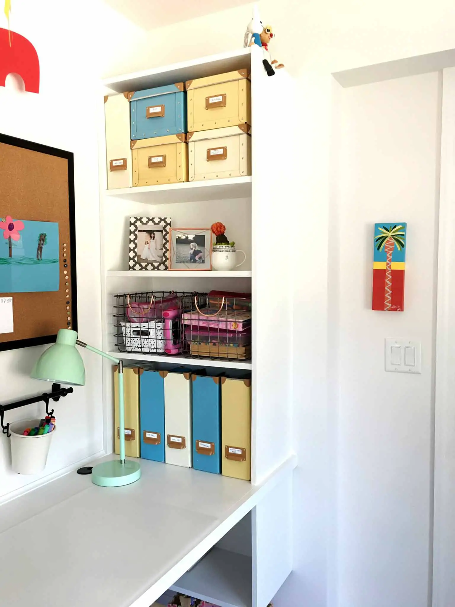 Kids art and craft station, built-in desk, closet and shelving - playroom house tour - That Homebird Life Blog