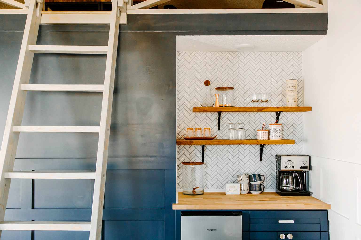 Kitchenette with hale navy cabinets, open shelving and herringbone tile - The Guest House Reveal - That Homebird Life Blog