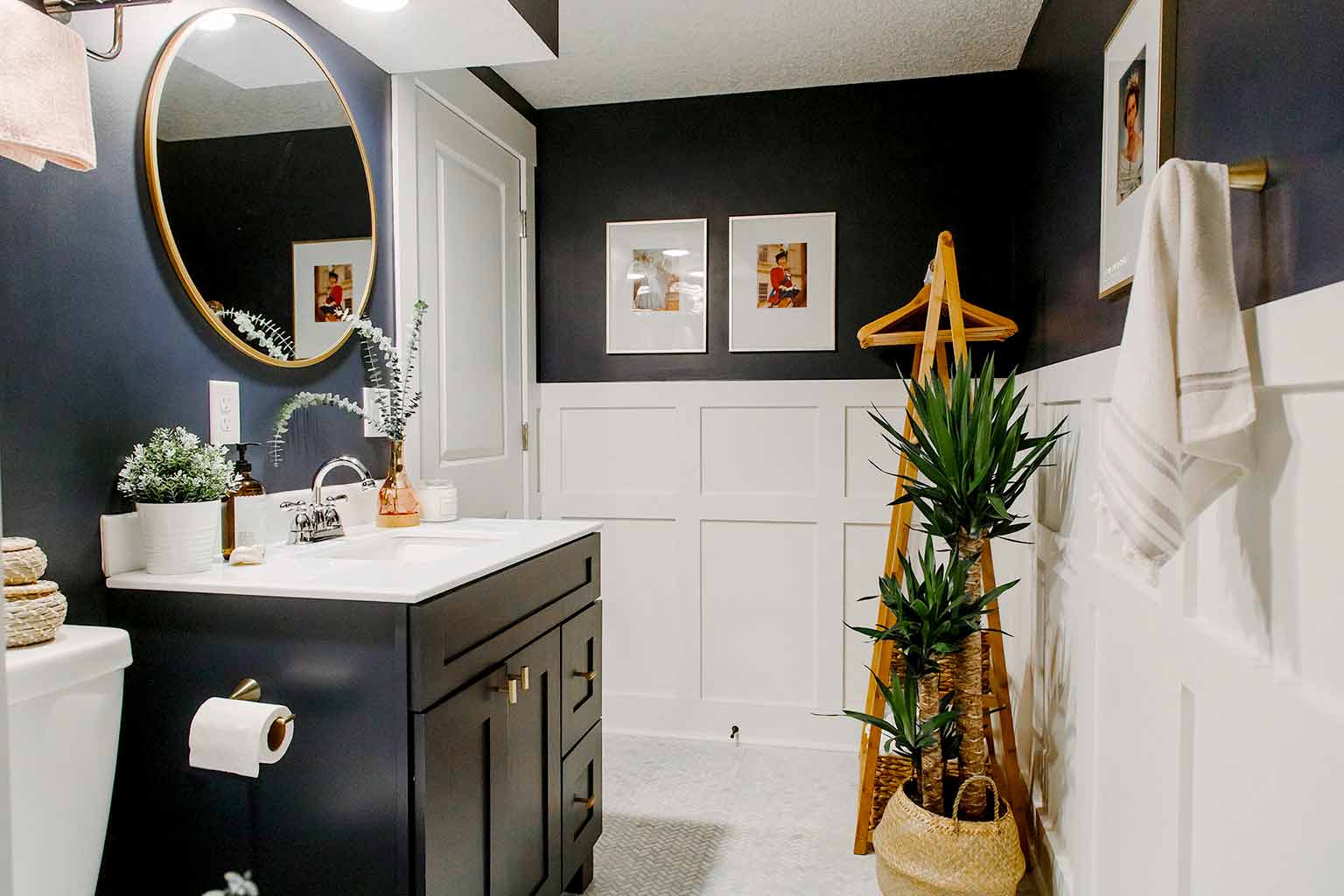 Hale navy bathroom with brass accents and board and batten - The Guest House Reveal - That Homebird Life Blog