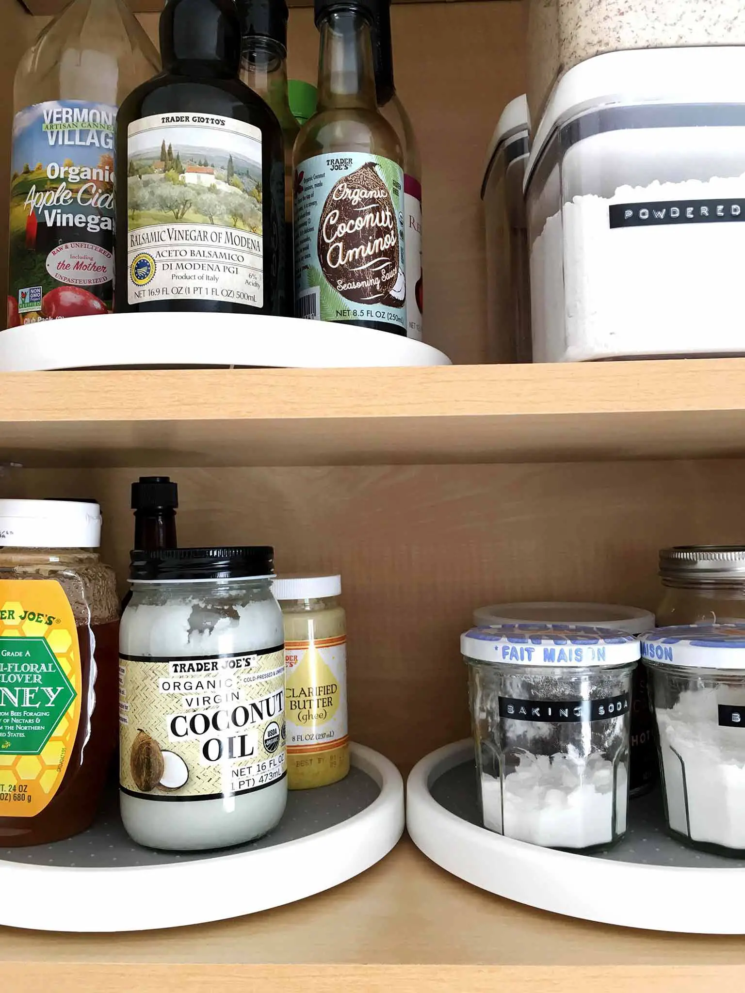 Organized kitchen cabinet with lazy susans - That Homebird Life Blog