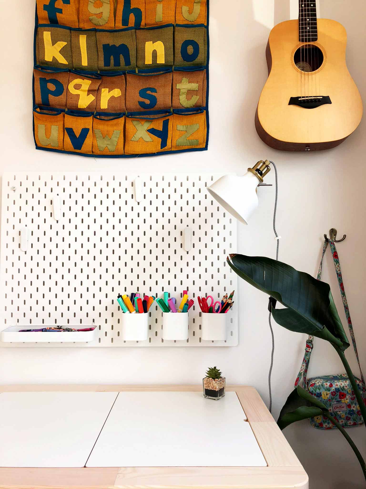 Kids craft area in the playroom using IKEA SKÅDIS pegboard series