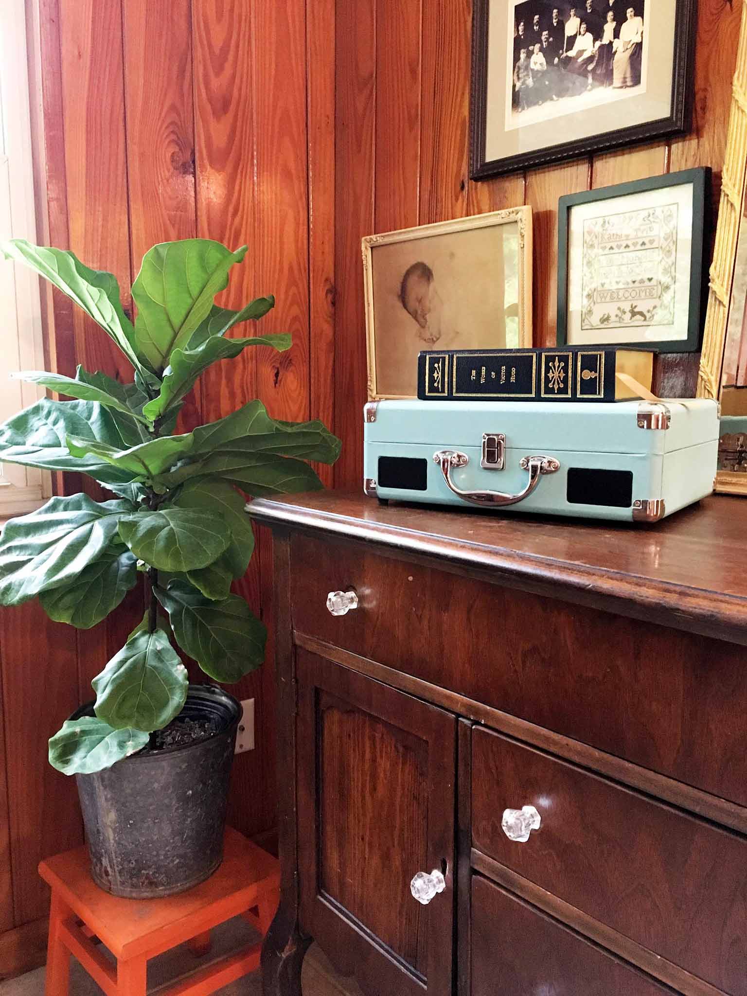 Sideboard and gallery wall - A Cozy & Eclectic Bonus Room Makeover - That Homebird Life Blog