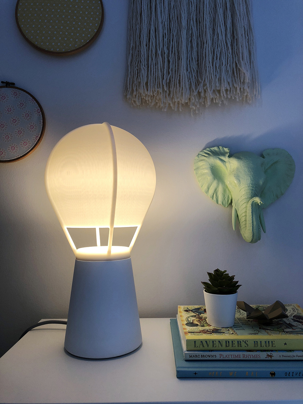 corner of girls bedroom with gantri table lamp