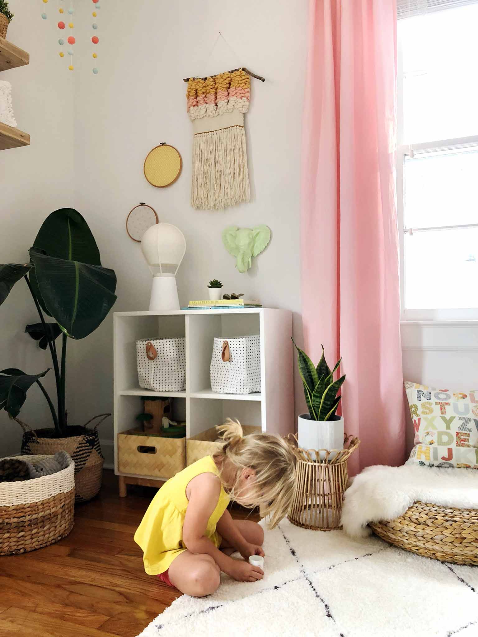 corner of girls bedroom with gantri table lamp