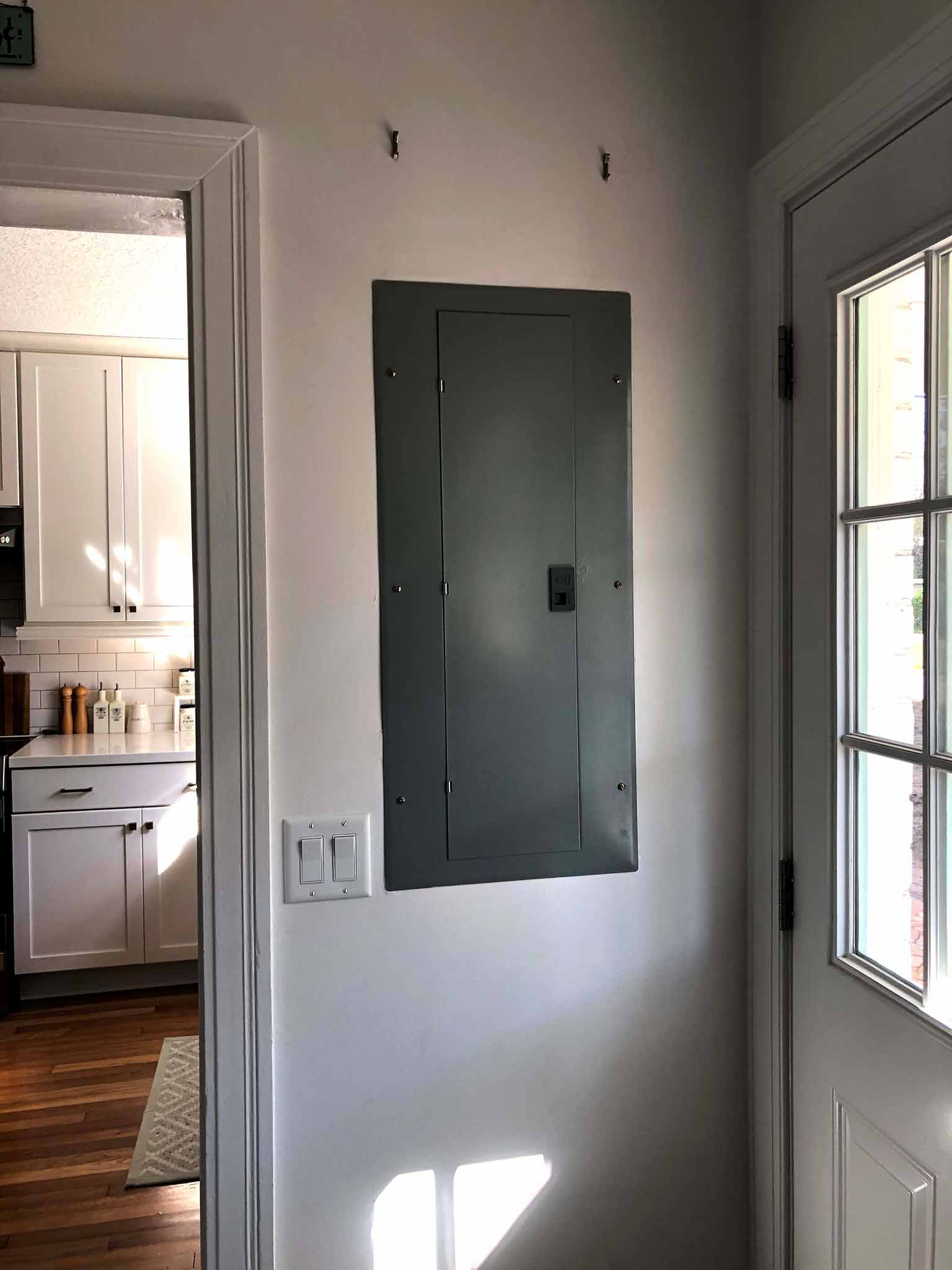 An Easy and Inexpensive Way to Cover up an Electrical Panel