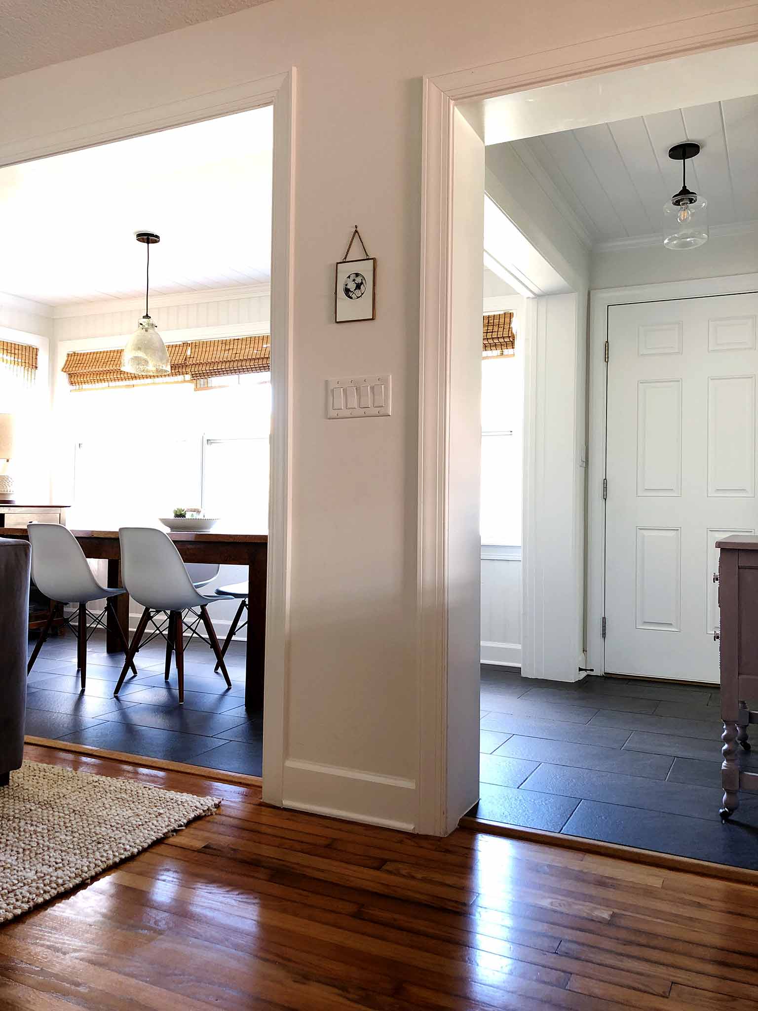 dining room with wooden table and eames chairs