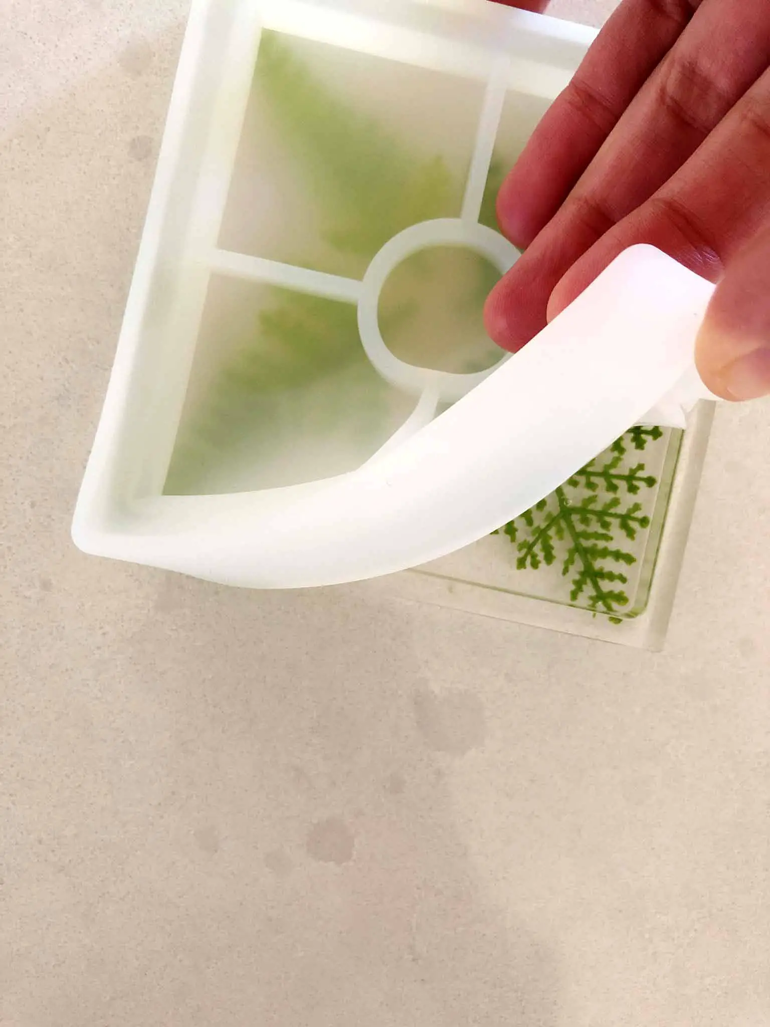 peeling silicone mold off resin coasters