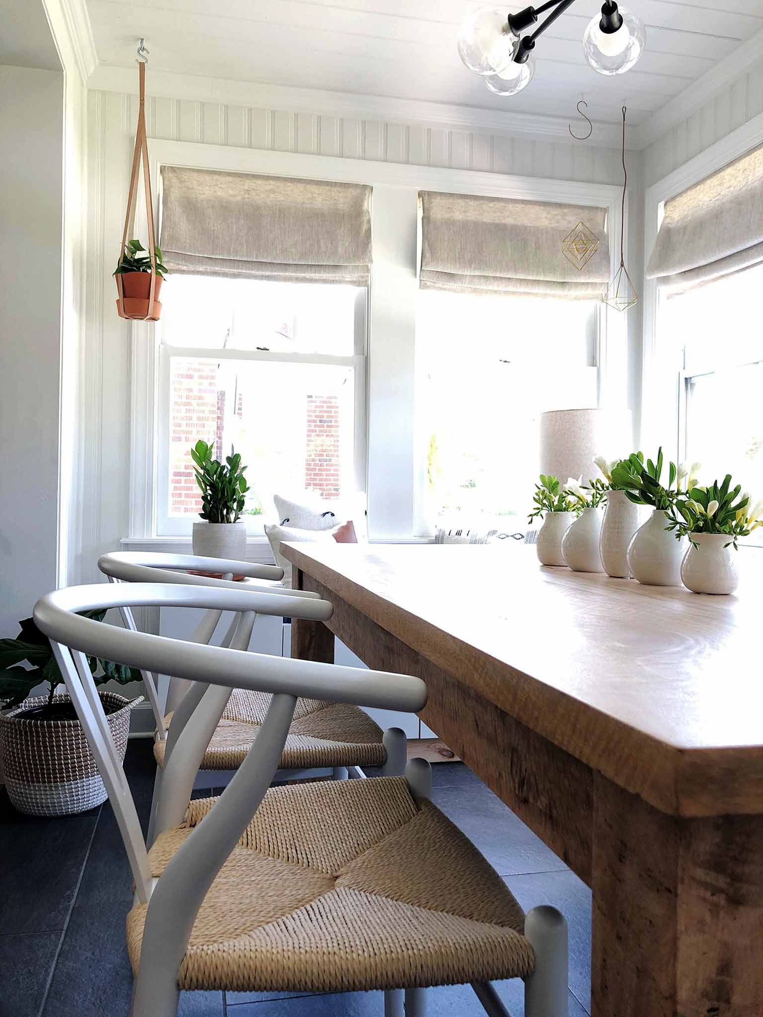 dining room table and mid century modern chairs