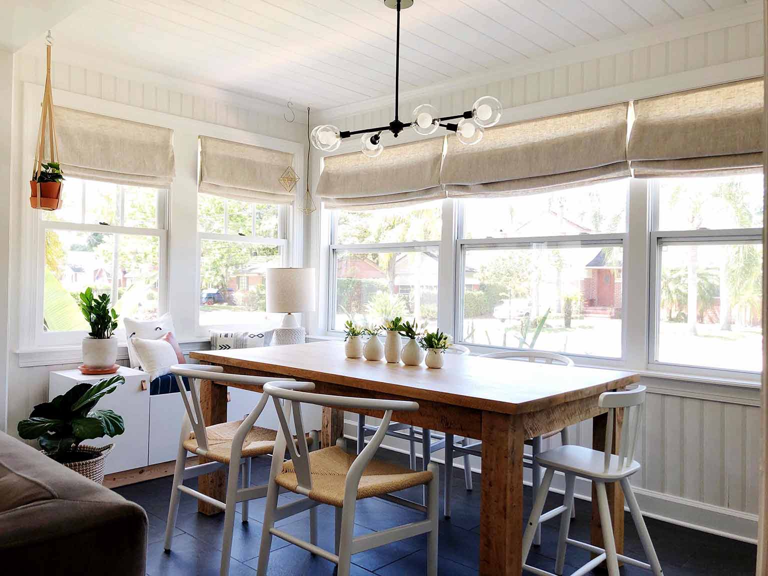 dining room table and mid century modern chairs