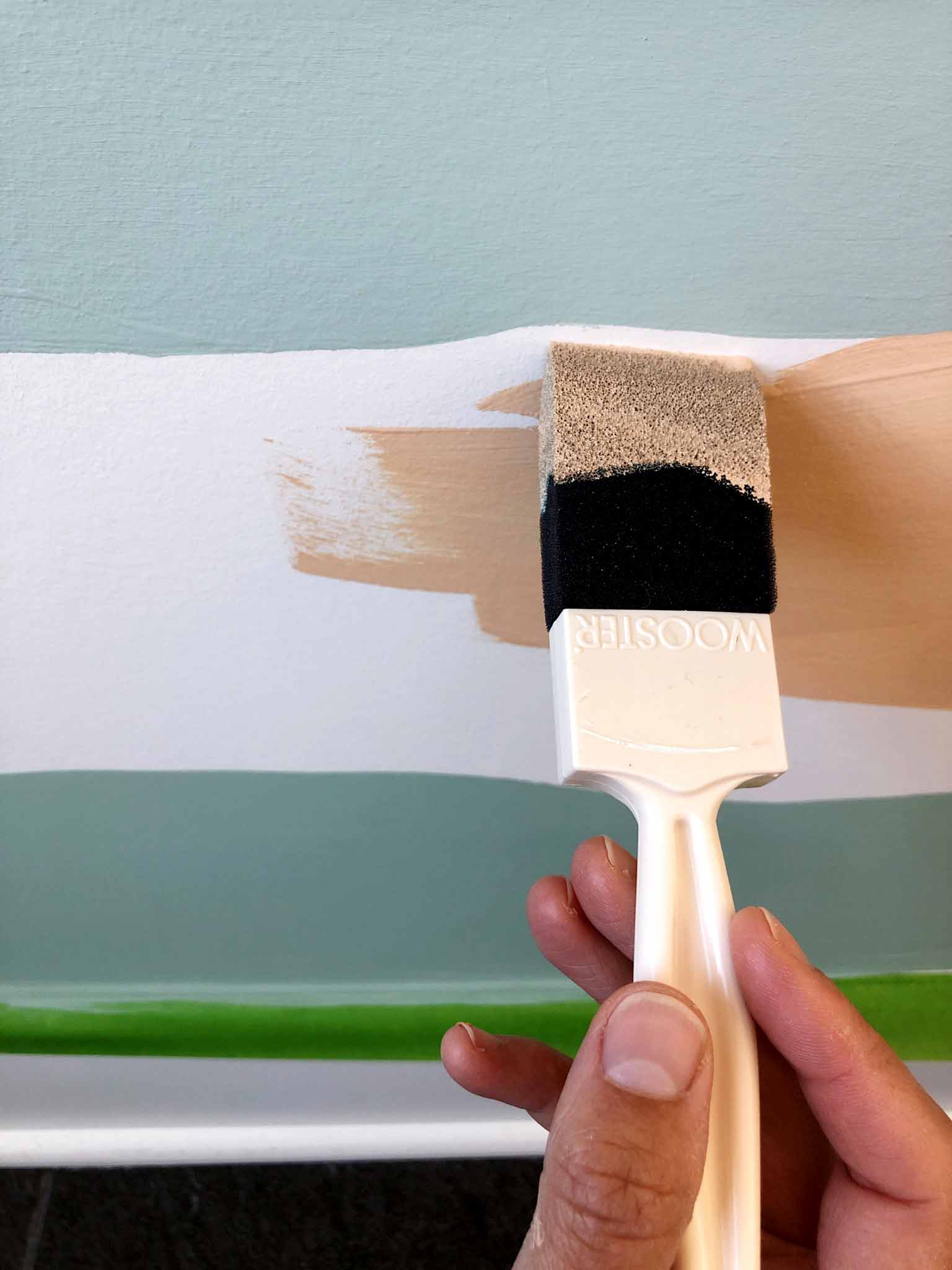 The Power of Paint: Adding Color to Our Playroom with a Modern Landscape Mural