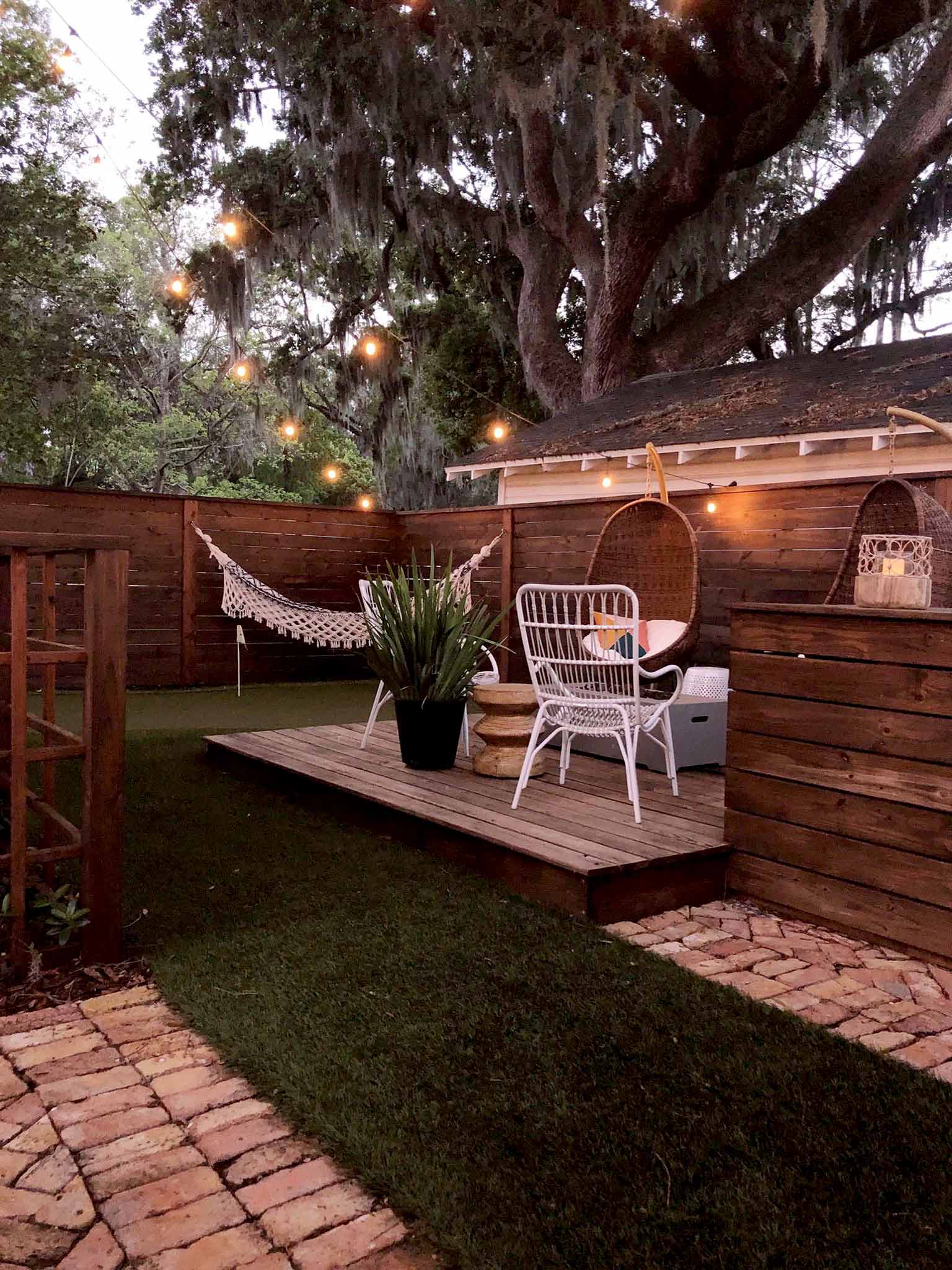 backyard deck under string lights