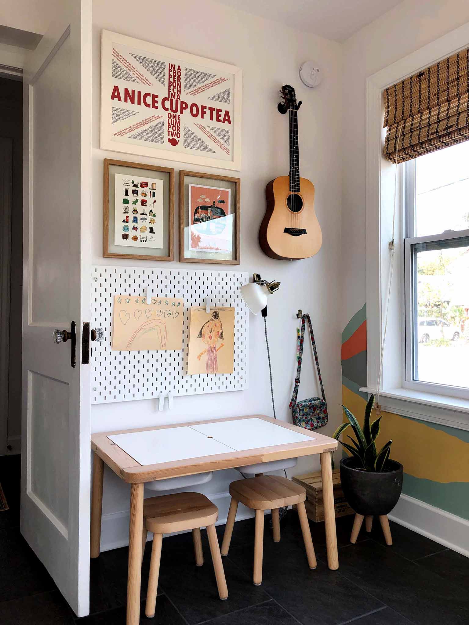 playroom with desk and two stools