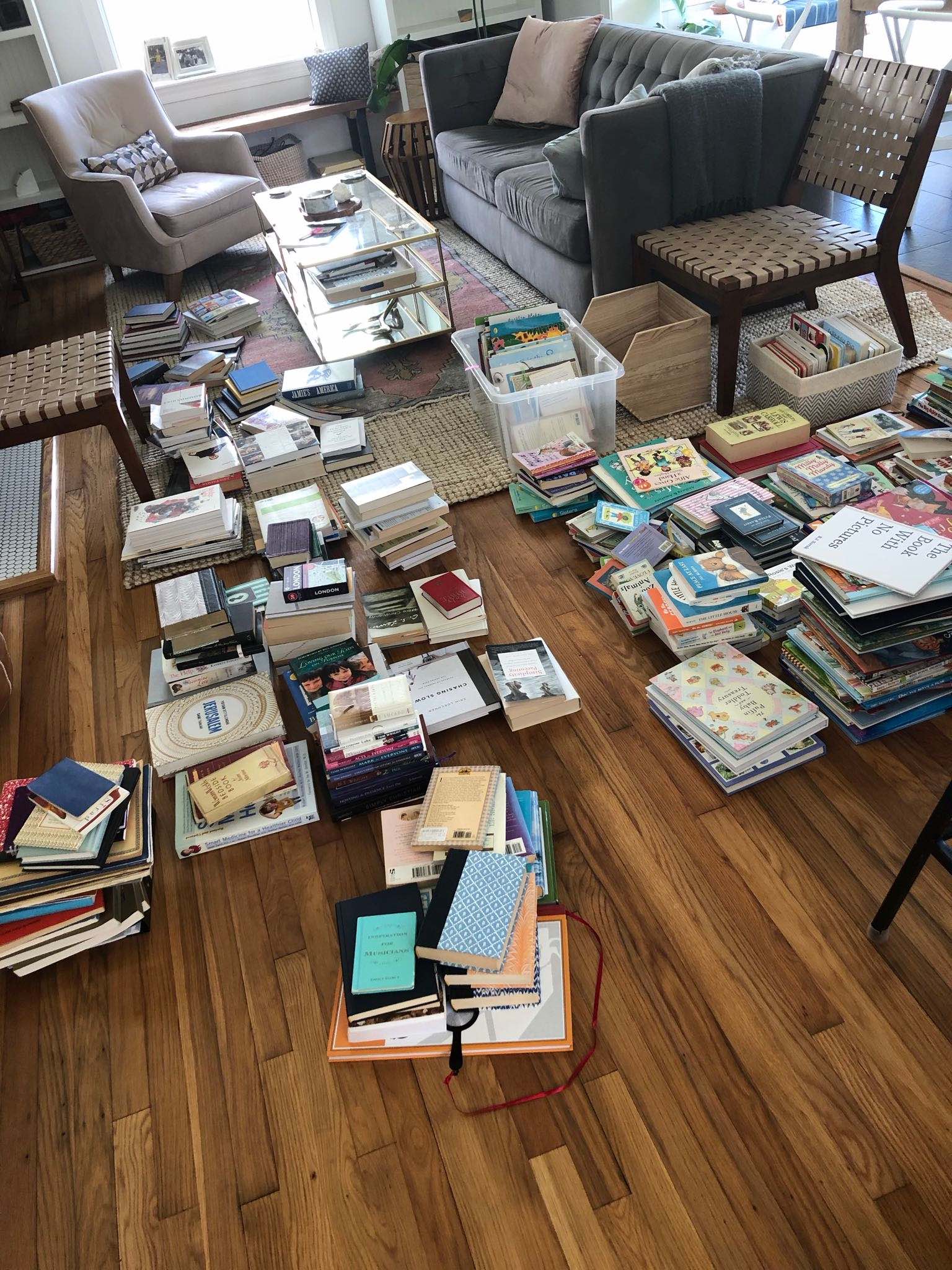 piles of books on the floor