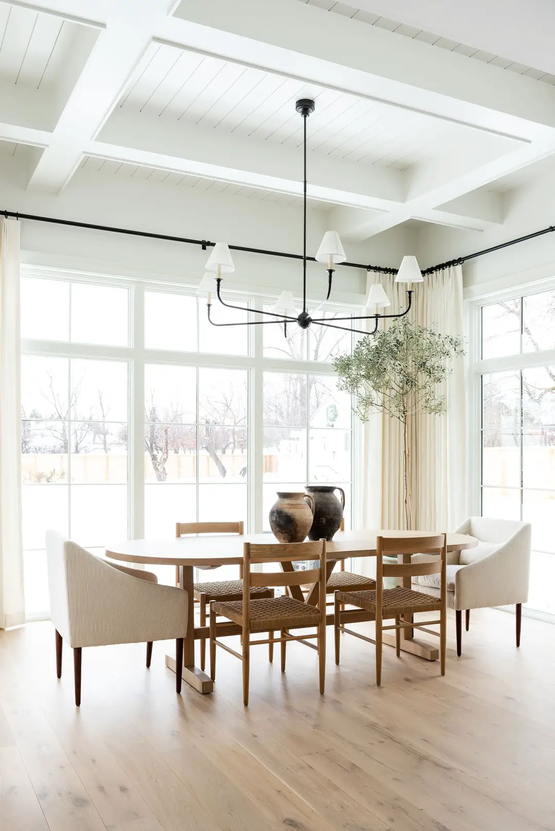 dining room with wood floors and natural light