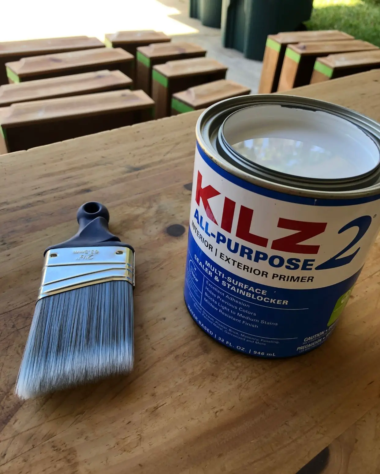 can of KILZ and a brush