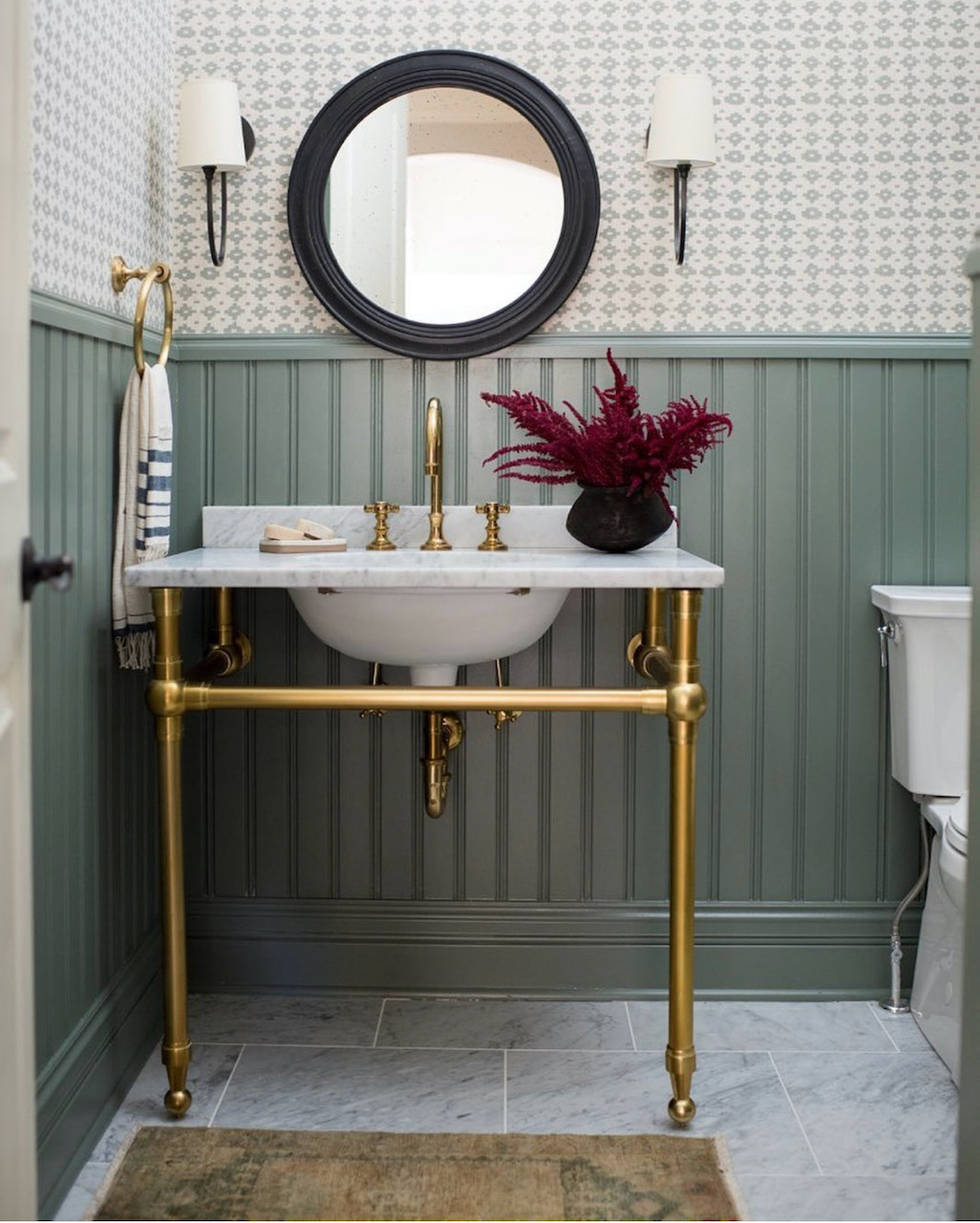 powder room with green beadboard walls