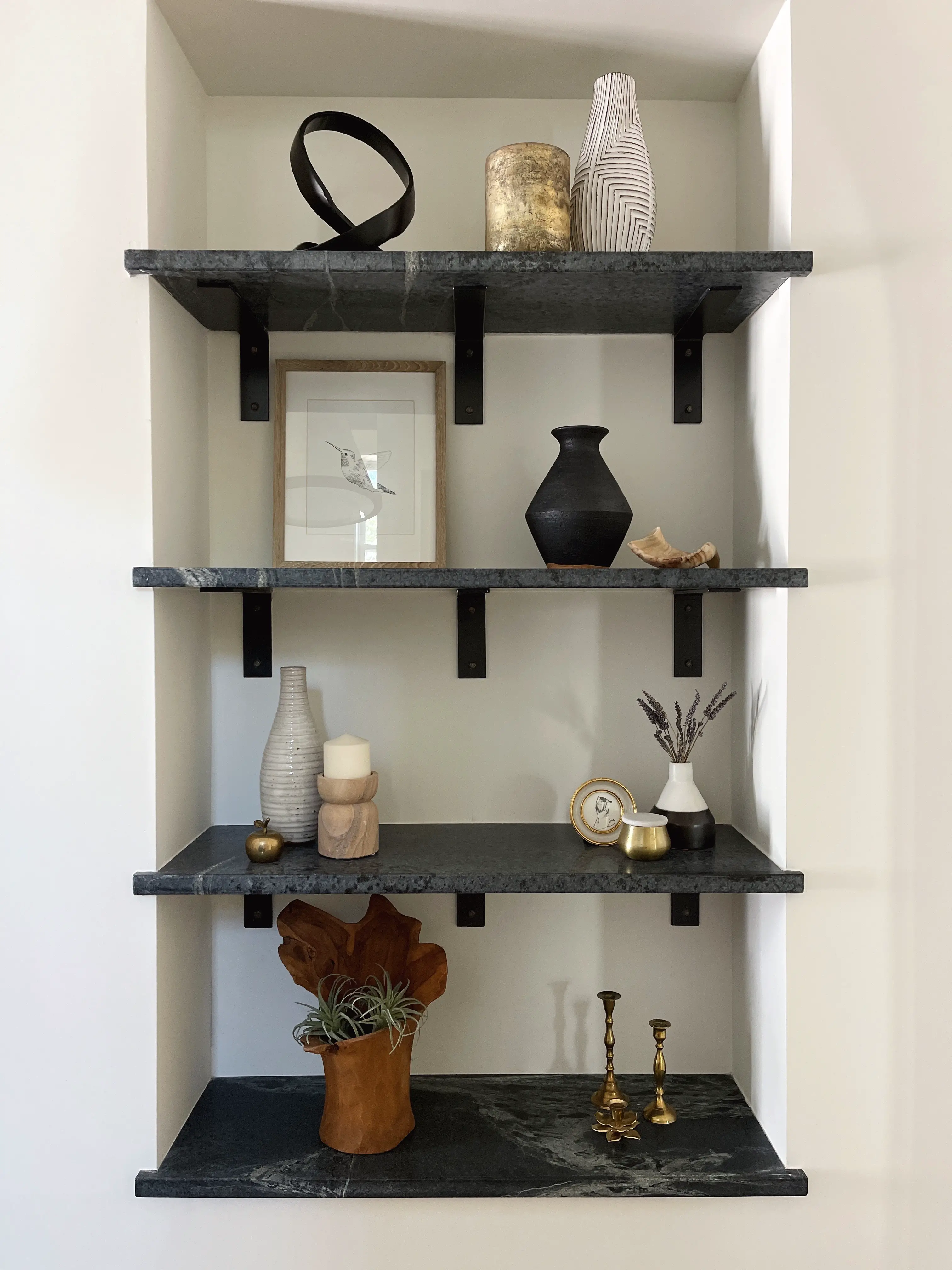 shelving niche with soapstone shelves
